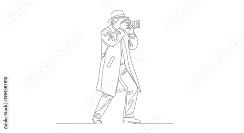 Man in coat holding camera.