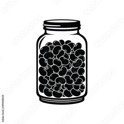 Black beans in a glass jar.