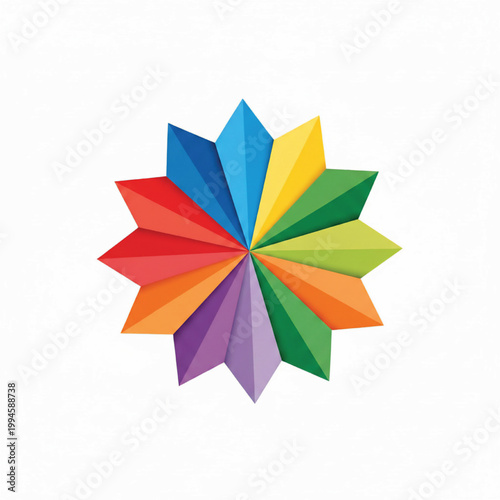 Paper pinwheel craft with colorful folded petals forming a spinning starburst design on white background