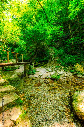 Bild auf Leinwand Kozjak waterfall in Slovenian alps near soca river