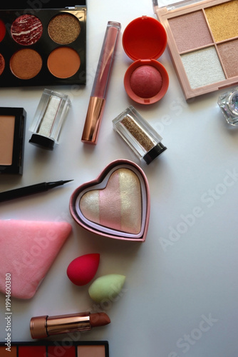 Various colorful cosmetic products on white background. Flat lay.