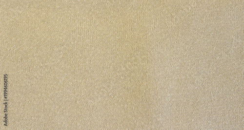 Schilderij op canvas Close-up beige knitted texture background