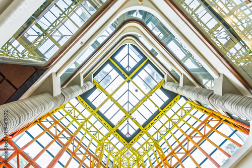 Fotografía Modern Architecture Interior Glass Skylight with Colorful Steel Truss Low Angle