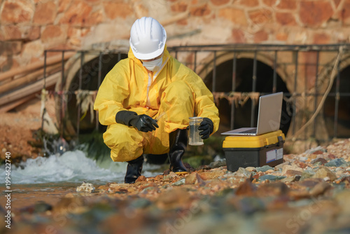 Photography Environmental sampling action by scientist riverbank field research urban enviro