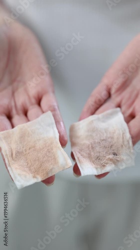Woman removing makeup with cotton pad in mirror, skincare routine, clean healthy skin, beauty treatment, freshness, hygiene, and natural glowing complexion.
