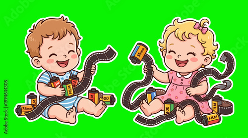Two Adorable Babies Playing with Photographic Film Reels and Smiling Happily.