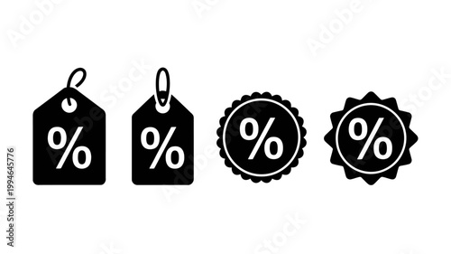 A collection of four black silhouette icons depicting various price tag and discount label designs with percentage symbols high quality professional detailed modern elegant stylish clean