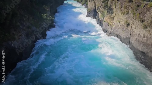Huka Falls, a powerful turquoise waterfall located on the Waikato River near Taupō in New Zealand