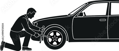 Man changing a car tire