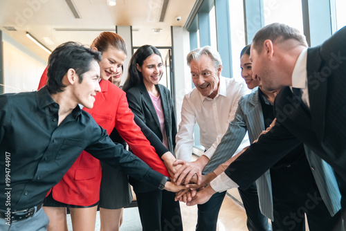 Business team office meeting group collaboration teamwork diverse people smiling people hands stack success support cooperative professional colleague workplace corporate meeting room conference