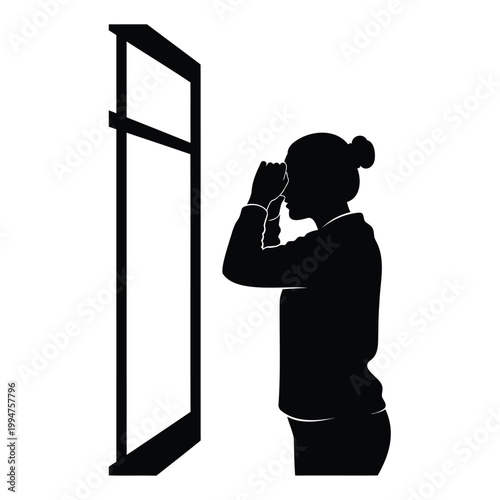 Silhouette of a woman looking through a magnifying glass