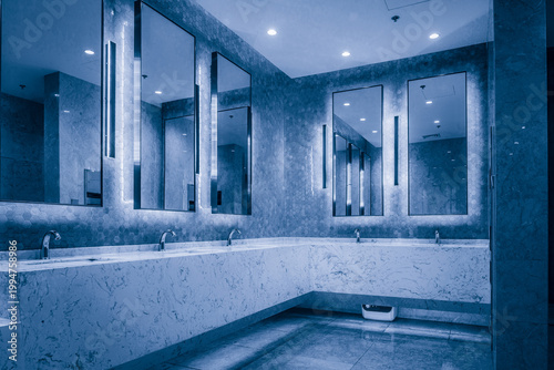 Elegant Modern Bathroom Interior with Elegant Lighting and Reflective Surfaces