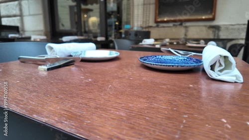 Outdoor Restaurant Table Setting In European City At Sunset