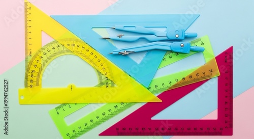 Collection of colorful geometric rulers and drafting tools for education.
