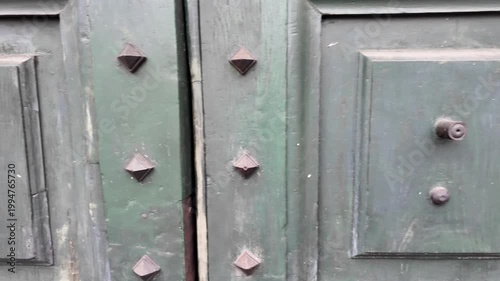 Old Green Italian Door In Rome With Weathered Texture