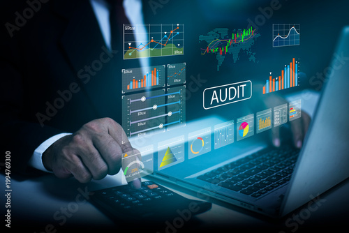 Businessman working on laptop with AUDIT online, business document evaluation process, market data report analysis and consulting, Analyst database development analytic.