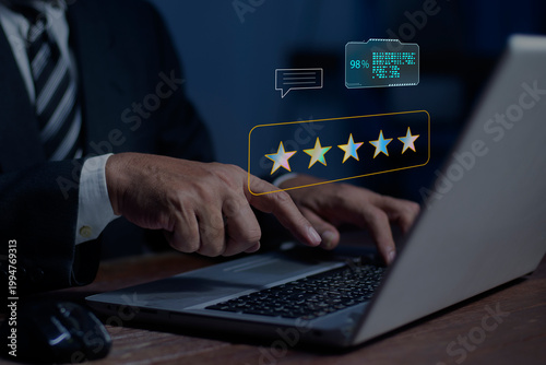 Business people using laptop with five star reviews. Good review 5 star rating choice feedback. Customer Service, Satisfaction Survey, positive testimonials, online reputation.