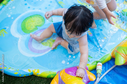 Fotografie 水遊びする子供達