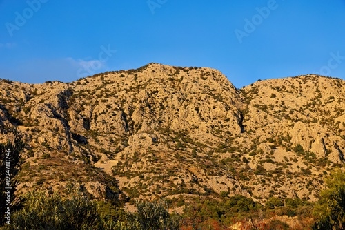 Mountains in the hinterland at sunset on the Makarska Riviera near Igrane in late summer