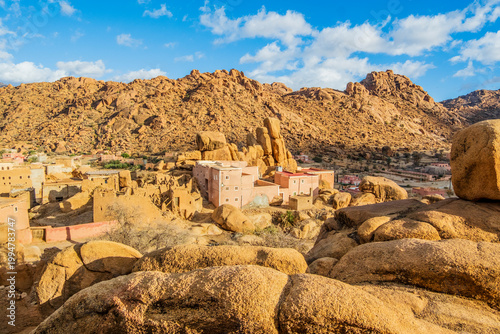 Billede på lærred Small village with houses, mountains and large stone blocks, Morocco, in  Tafrao