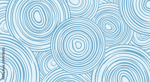 Abstract seamless pattern of concentric circles in blue and white colors.