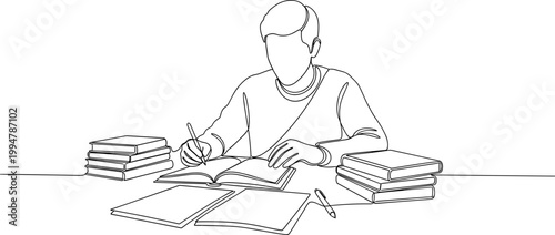 Student studying at desk with books, writing and learning
