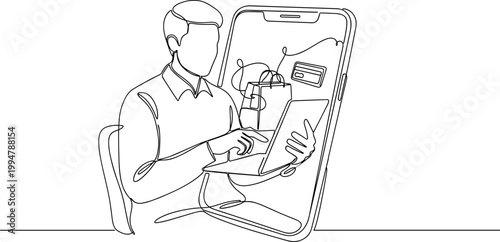 Online shopping concept, man using laptop with smartphone displaying shopping bag and credit card