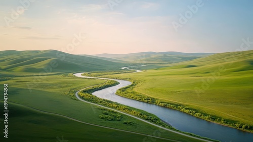 A Winding River Flows Through Lush Green Rolling Hills Under a Soft Bright Sky, A Picture of Natural Beauty