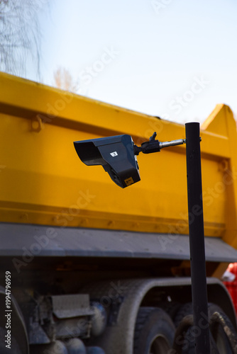 Digital laser receiver and level sensor on construction site surveying pole