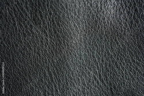 Tablou pe pânză macro texture of black biker leather jacket viewed from top