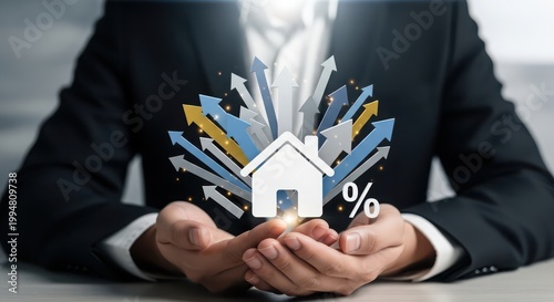 Businessman holding a house icon with rising arrows and percentage sign