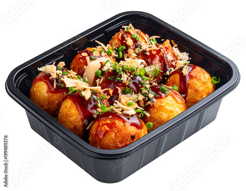 Golden fried dough balls topped with savory sauce, green onions, and flakes