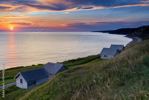Sunset View Over the Coast With Cabins on the Hillside in a Quiet Location