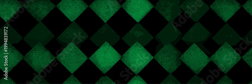 Repeating geometric diamond pattern featuring dark green and black colors creating a textured graphic backdrop. Dark green and black harlequin pattern background