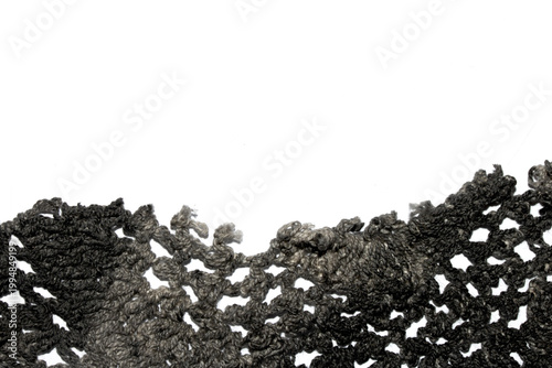 Close up of vintage black gothic lace fabric white on black background embroidery