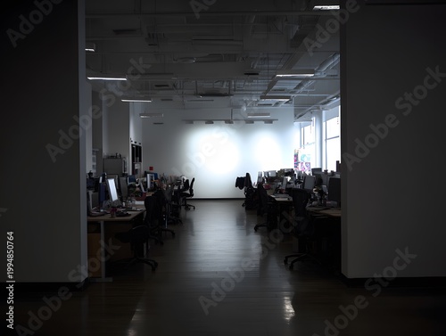 Dimly Lit Empty Office Workspace View Through Open Doorway at Night