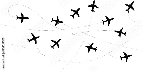 Silhouettes of airplanes with flight paths aviation