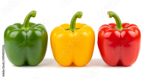 Green, yellow and red bell peppers white background