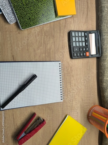 Stationery items laid out on a flat background. Education concept.