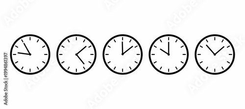 Tableau sur toile Clocks showing different times of day.