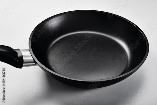 Cookware Sits on a Plain Background Ready for Cooking Meals in the Kitchen