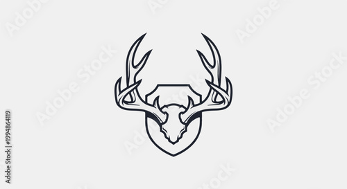Rustic deer skull emblem with imposing antlers displayed on a shield