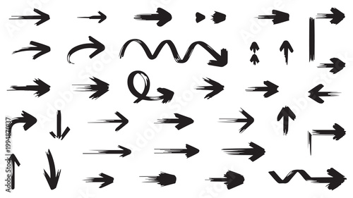 Set of black hand drawn arrows and pointer signs with rough brush stroke texture for creative design projects and digital graphic elements