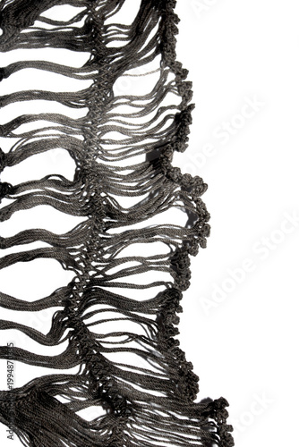 Close up of vintage black gothic lace fabric white on black background embroidery