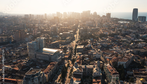 Urban skyline Batumi cityscape, drone panorama, coastal downtown growth, modern architecture, real estate development, travel destination, Black Sea metropolis.