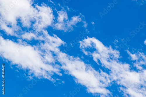 Blue sky with beautiful white fluffy clouds, natural blue skyscape, cloudscape with copy space. Scenic beauty of nature of Leh, Ladakh, India. Ladakh is known for clear atmosphere, bright environment.