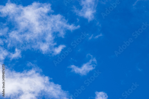 Blue sky with beautiful white fluffy clouds, natural blue skyscape, cloudscape with copy space. Scenic beauty of nature of Leh, Ladakh, India. Ladakh is known for clear atmosphere, bright environment.