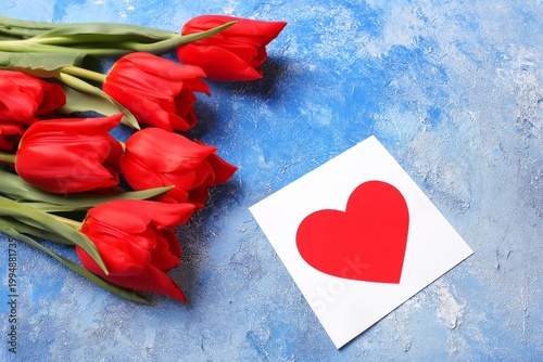 Roses in a Blue Vase Against a Bright Red Background