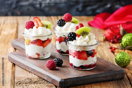 Fresh Berries and Cream Dessert Served in Jars on a Wooden Board at a Summer ...