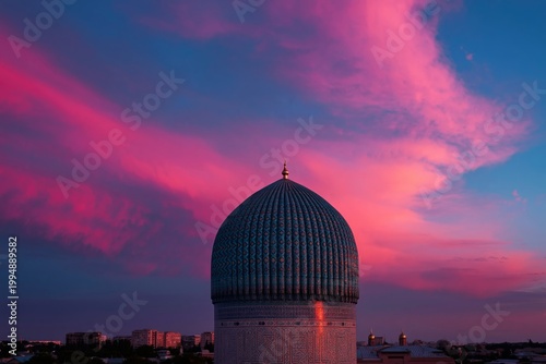 Sunset Over the Dome of a Historic Building in a City With Colorful Clouds in...